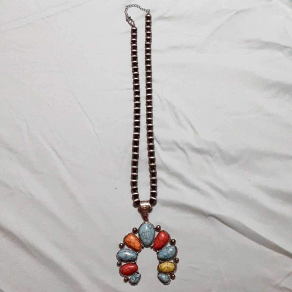 Navajo beads with multicolored stones squash blossom